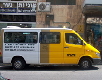 A picture of a shuttle van from Nesheret Tours